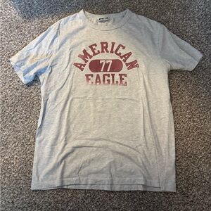American Eagle Outfitters Light Gray Tee with Maroon Graphic